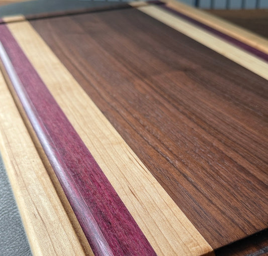 Premium collection handmade maple, purple heart & black walnut wood cutting board