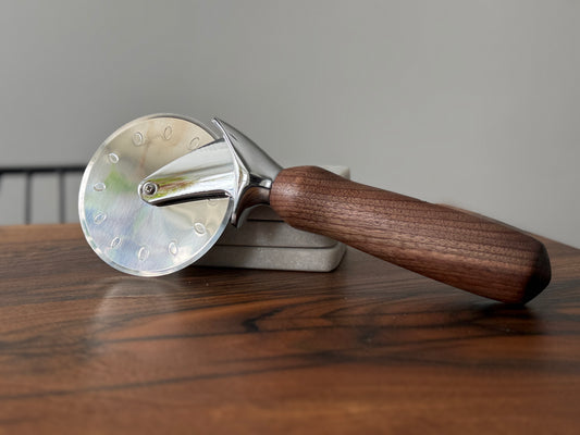 Handmade black walnut pizza cutter