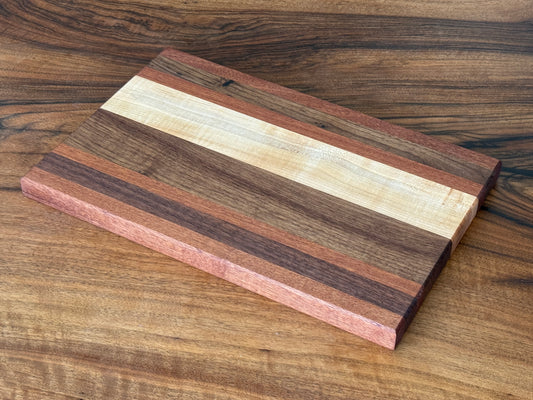 handmade black walnut, sapele and maple wood cutting board