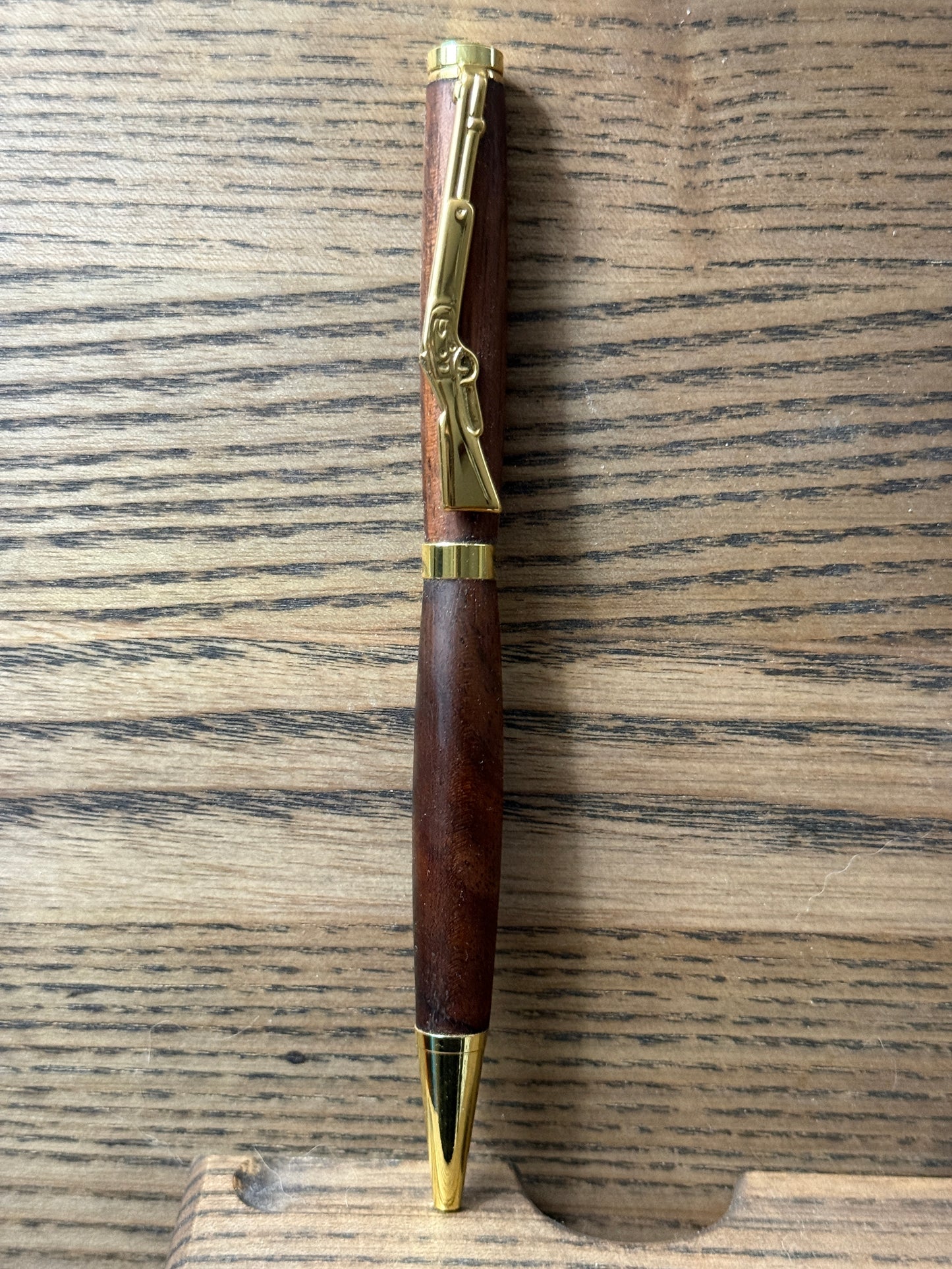 Handmade black walnut wood pen with rifle clip